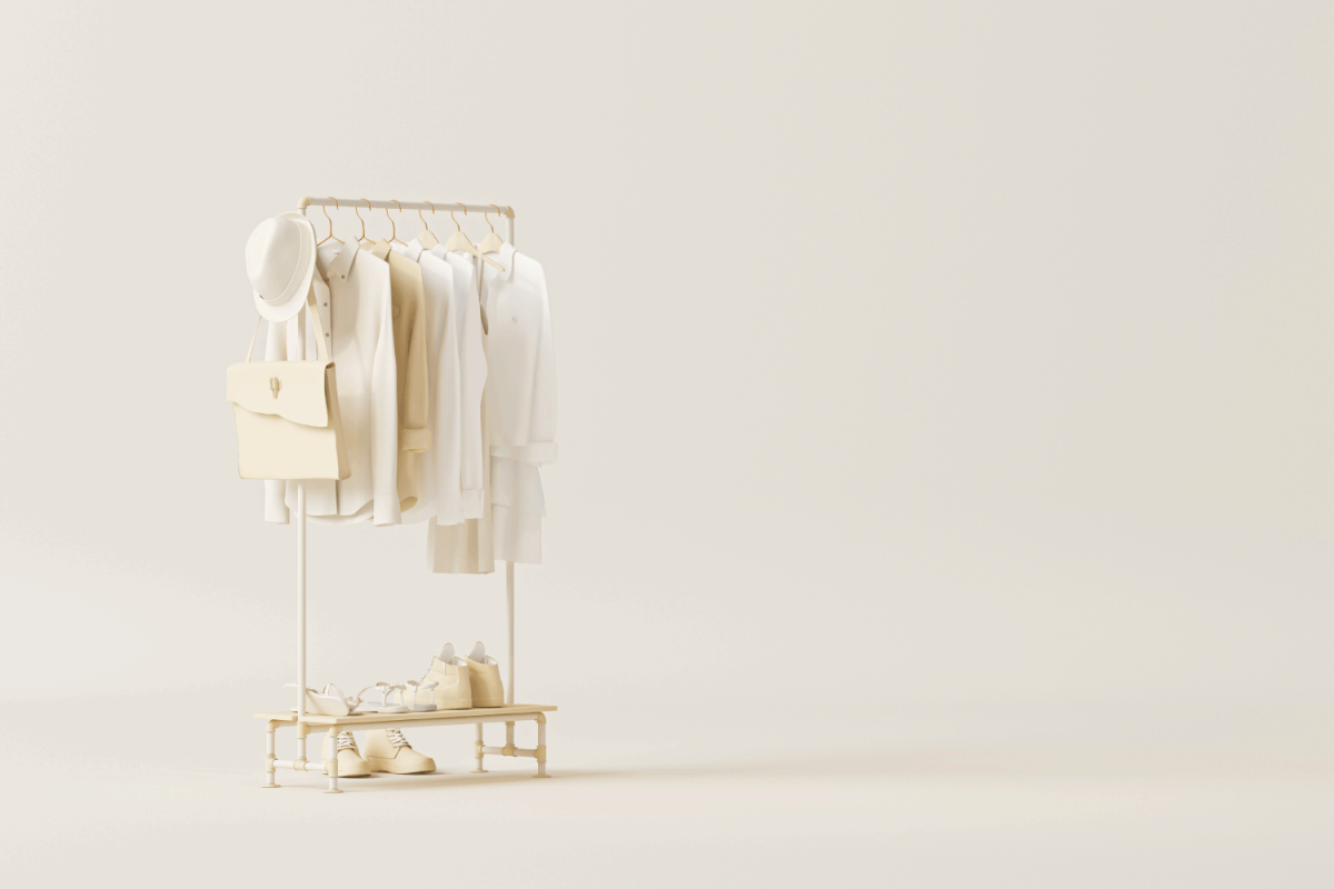 Clothes on a hanger, storage shelf in a cream background