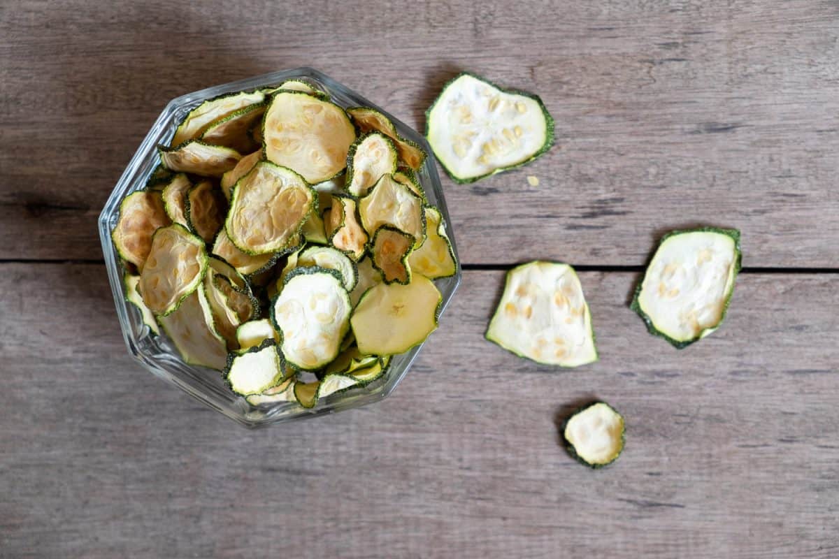 Dried zucchini in a wood bowl,chips oven baked

