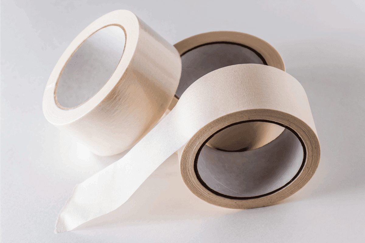 Few rolls of paper masking tape. How To Remove Brown Packing Tape Residue