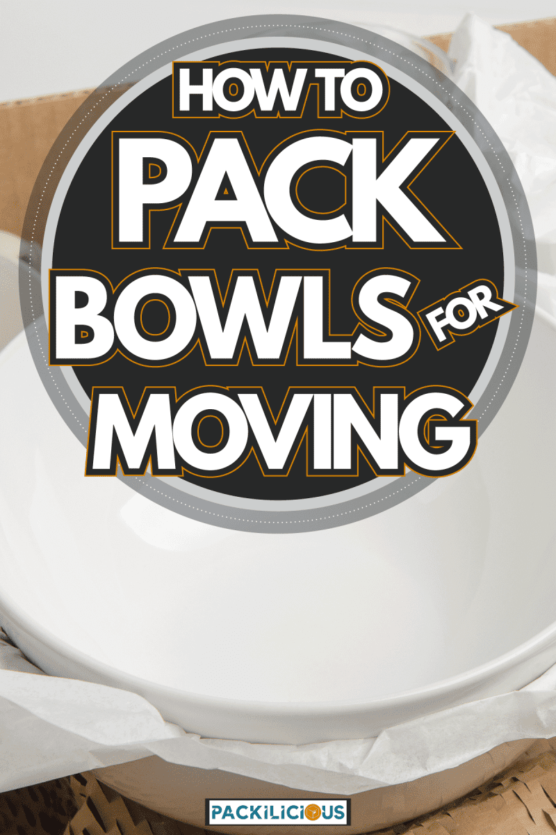 Clean white Bowls dishes in paper packed in cardboard box, How To Pack Bowls For Moving