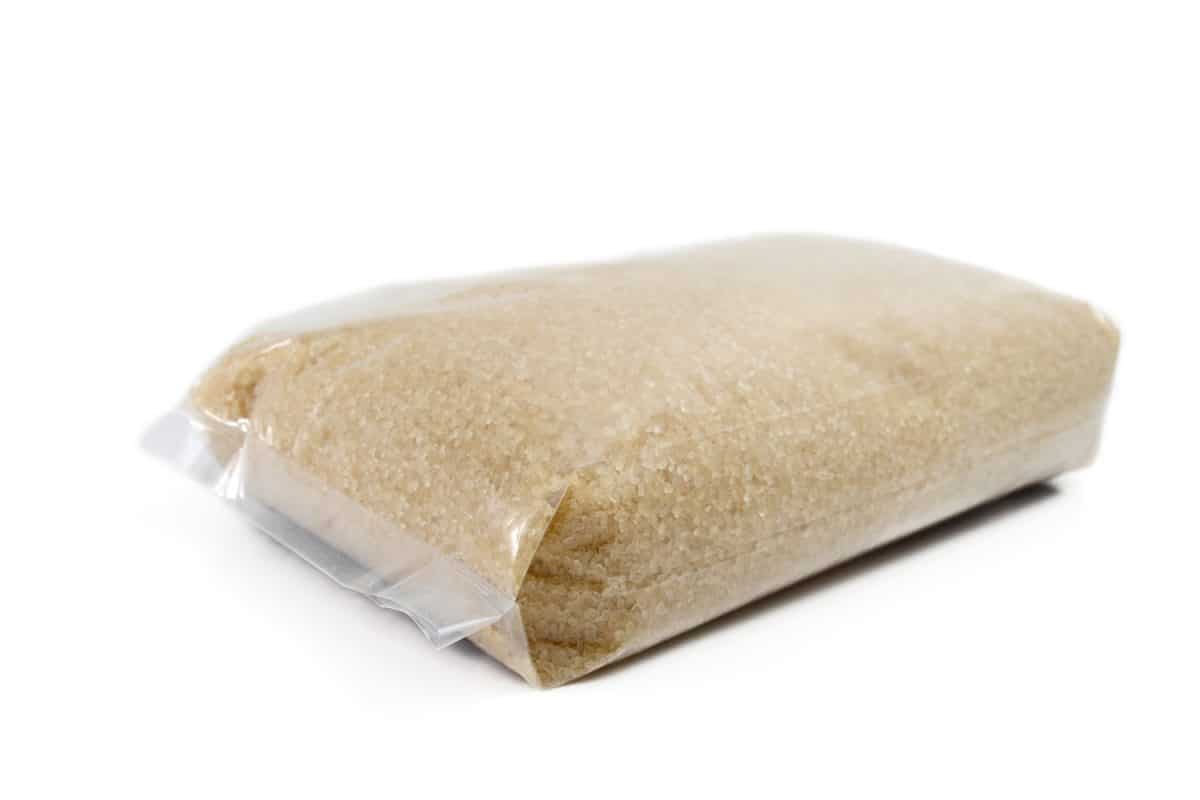 Plastic Bag of Sugar Isolated on White

