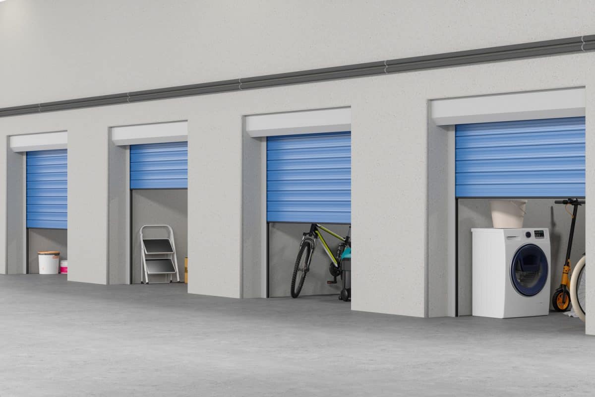 Self Storage Warehouse With Bicycle, Washing Machine And Other Household Equipments

