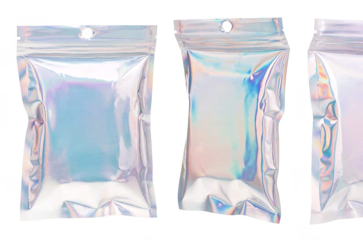 Set of Aluminum foil bag Plastic Laser Mylar Foil Zip Lock Bag isolated on white background.
