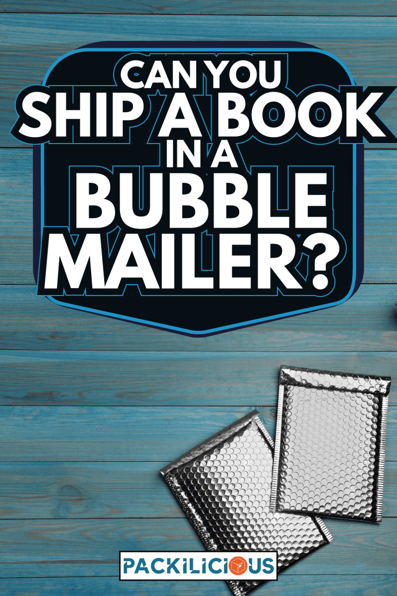 Two padded envelopes with bubble wrap on light blue wooden background, flat lay. Can You Ship A Book In A Bubble Mailer 
