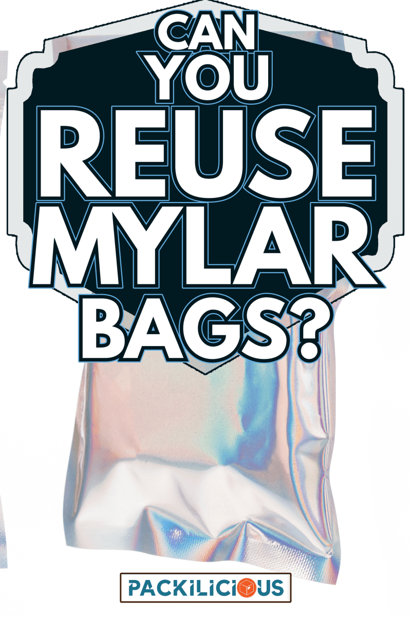 hand holding Aluminum foil bag Plastic Laser Mylar Foil Zip Lock Bag isolated on white background - Can You Reuse Mylar Bags