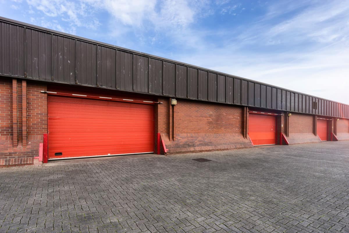 row of red storage warehouse facility