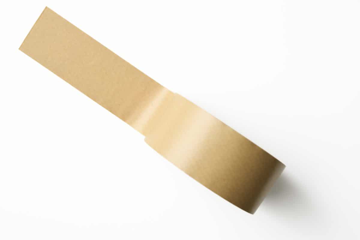 A roll of brown parcel tape isolated on white with clipping path.

