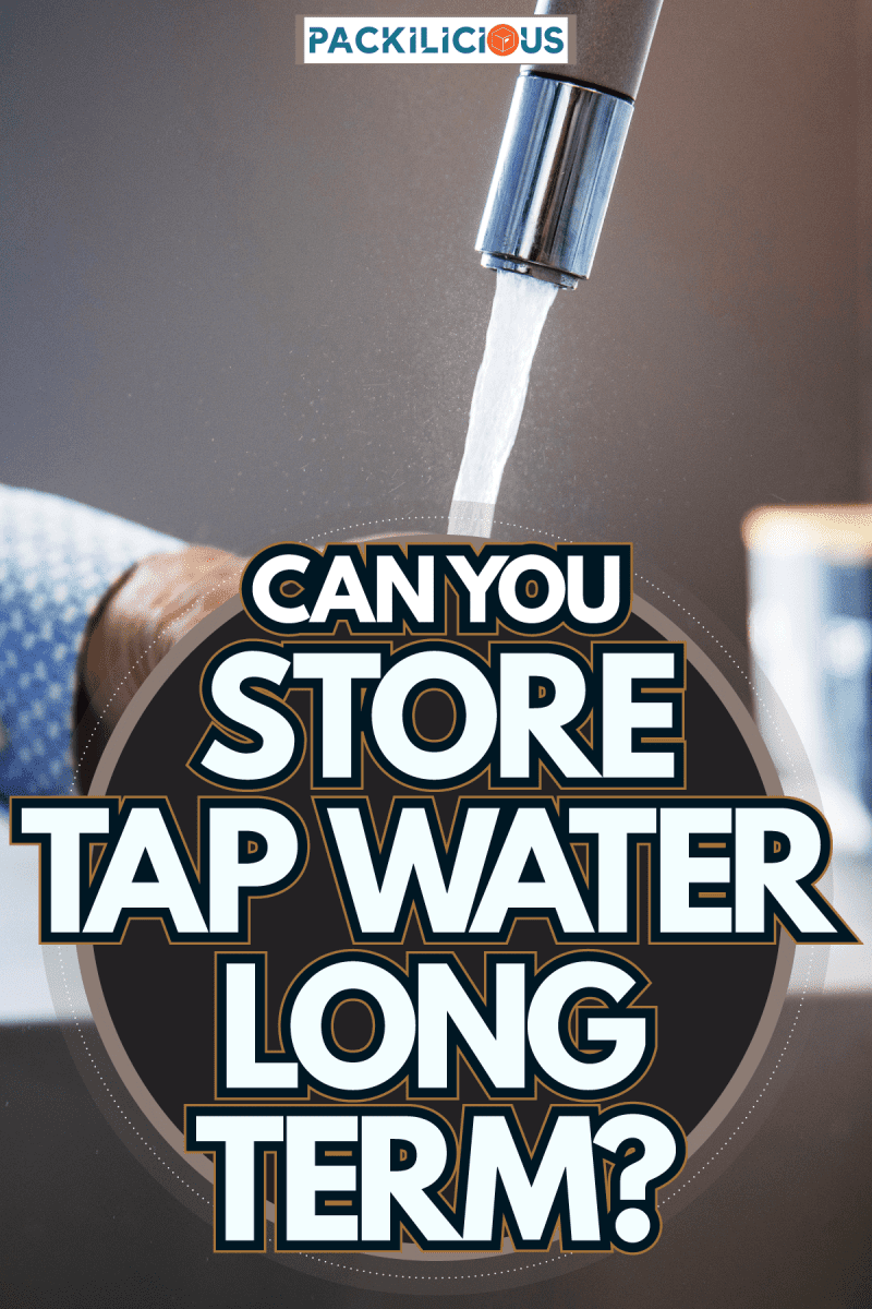 Man taking a glass of water, Can You Store Tap Water Long Term?