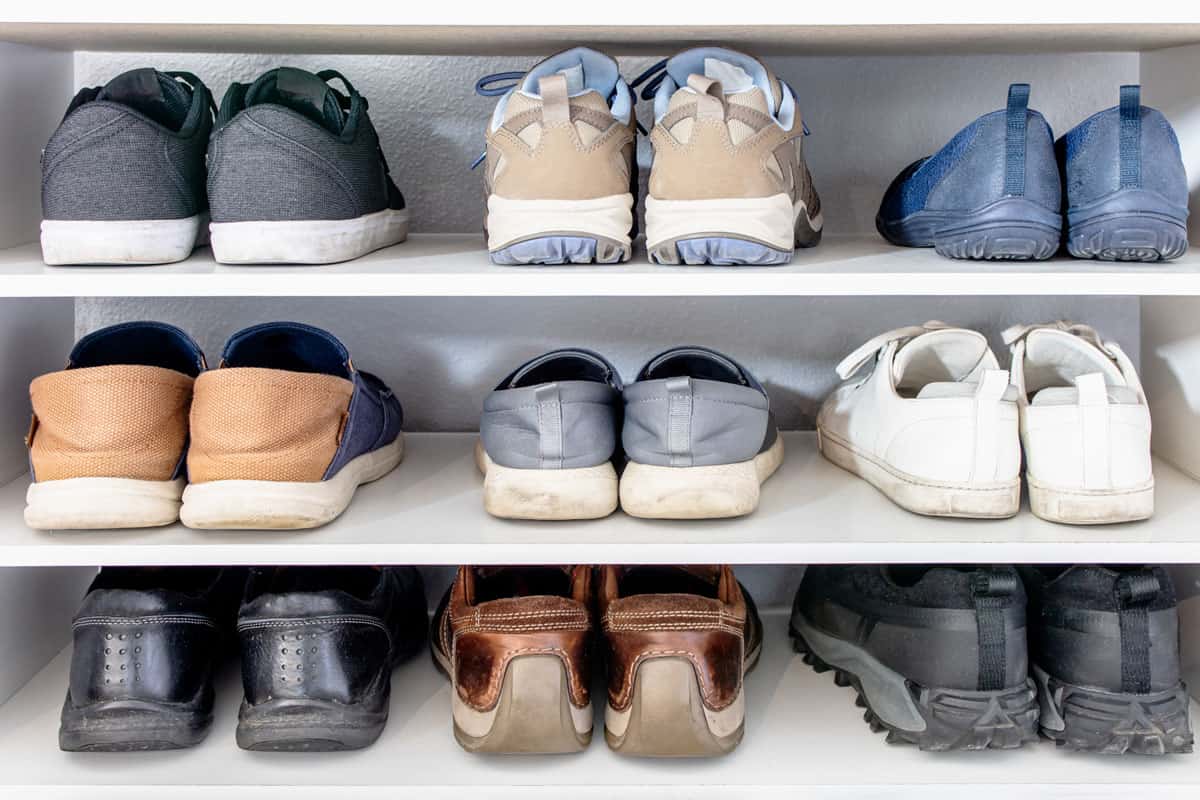 Categorized and organized shoes in shoe rack