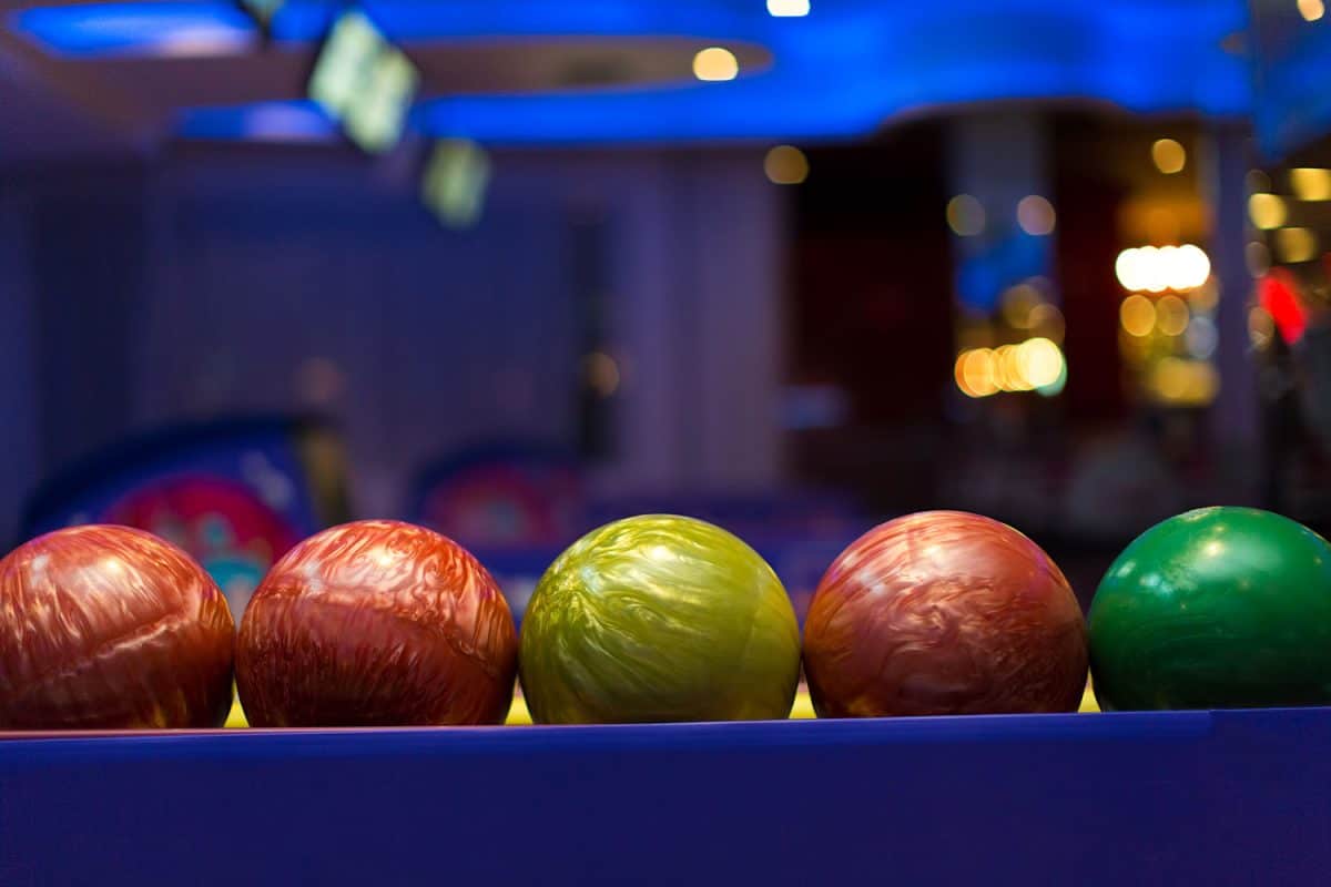 Different colors of bowling balls in the bowling alley