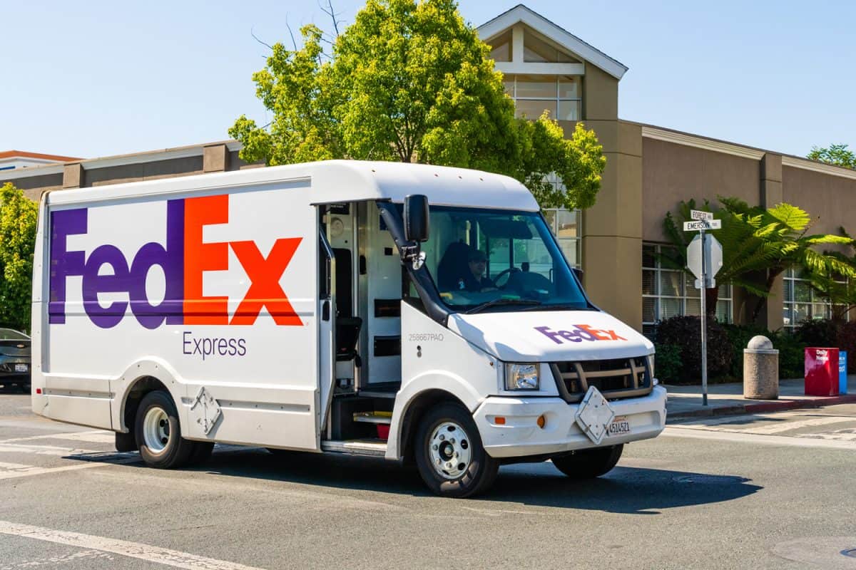 FedEx vehicle making deliveries