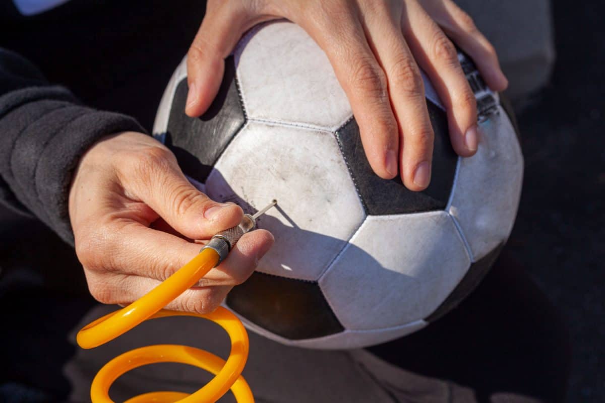 Inflating a soccer ball