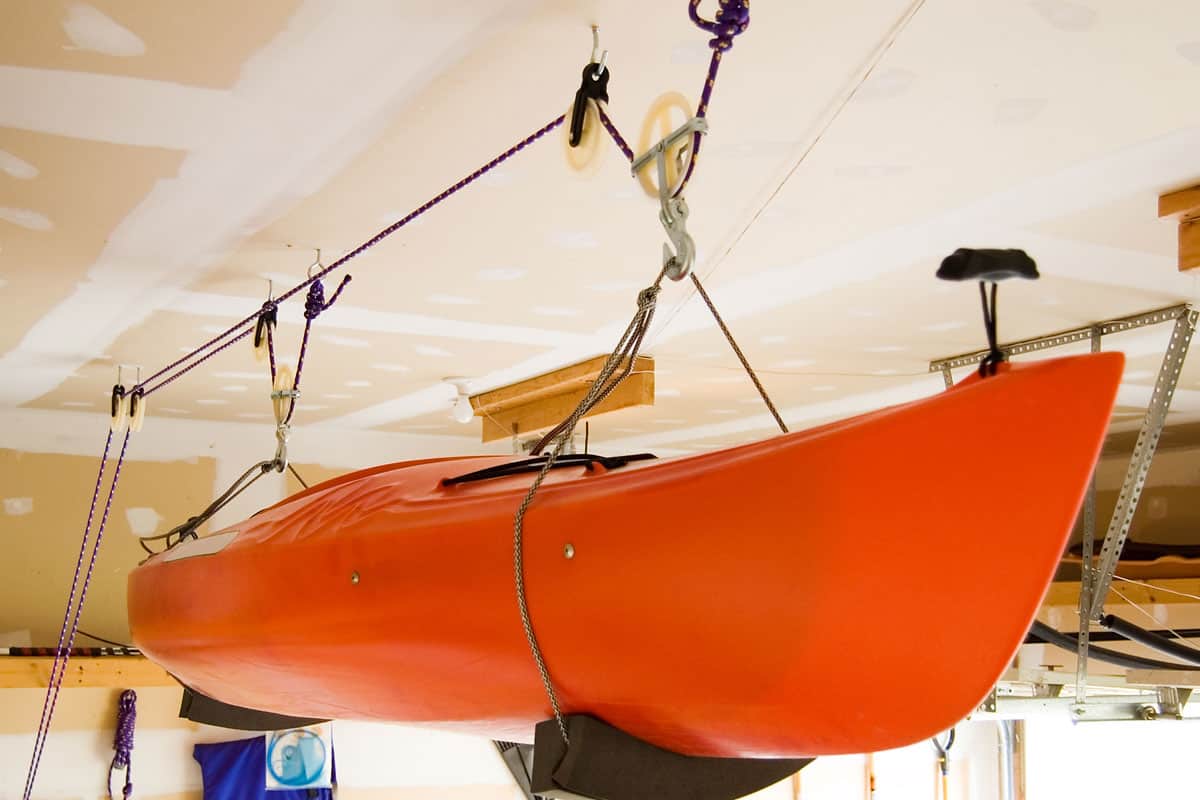Kayak stored using pulley system