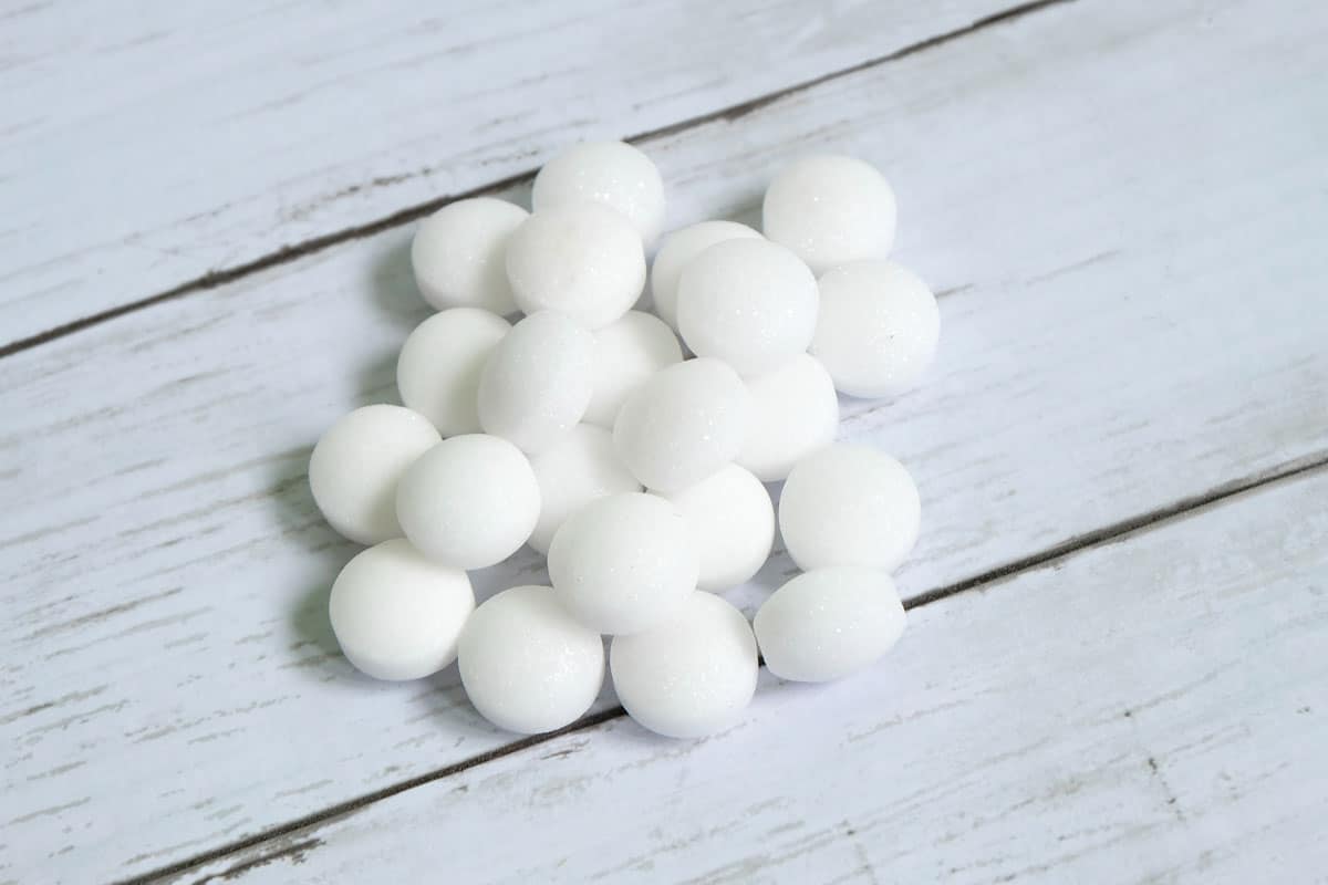 White mothballs in a wood