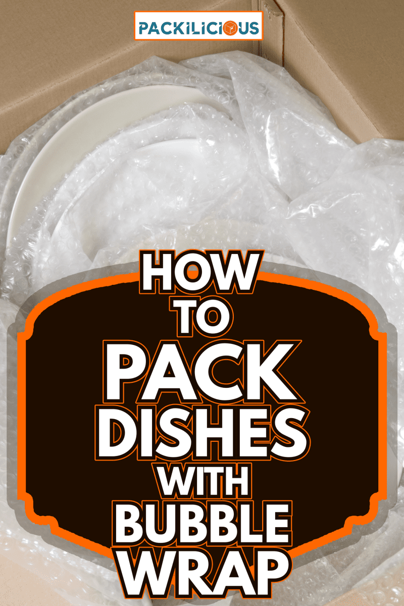 White plates wrapped in bubble wrap stacked in a moving box - How To Pack Dishes With Bubble Wrap