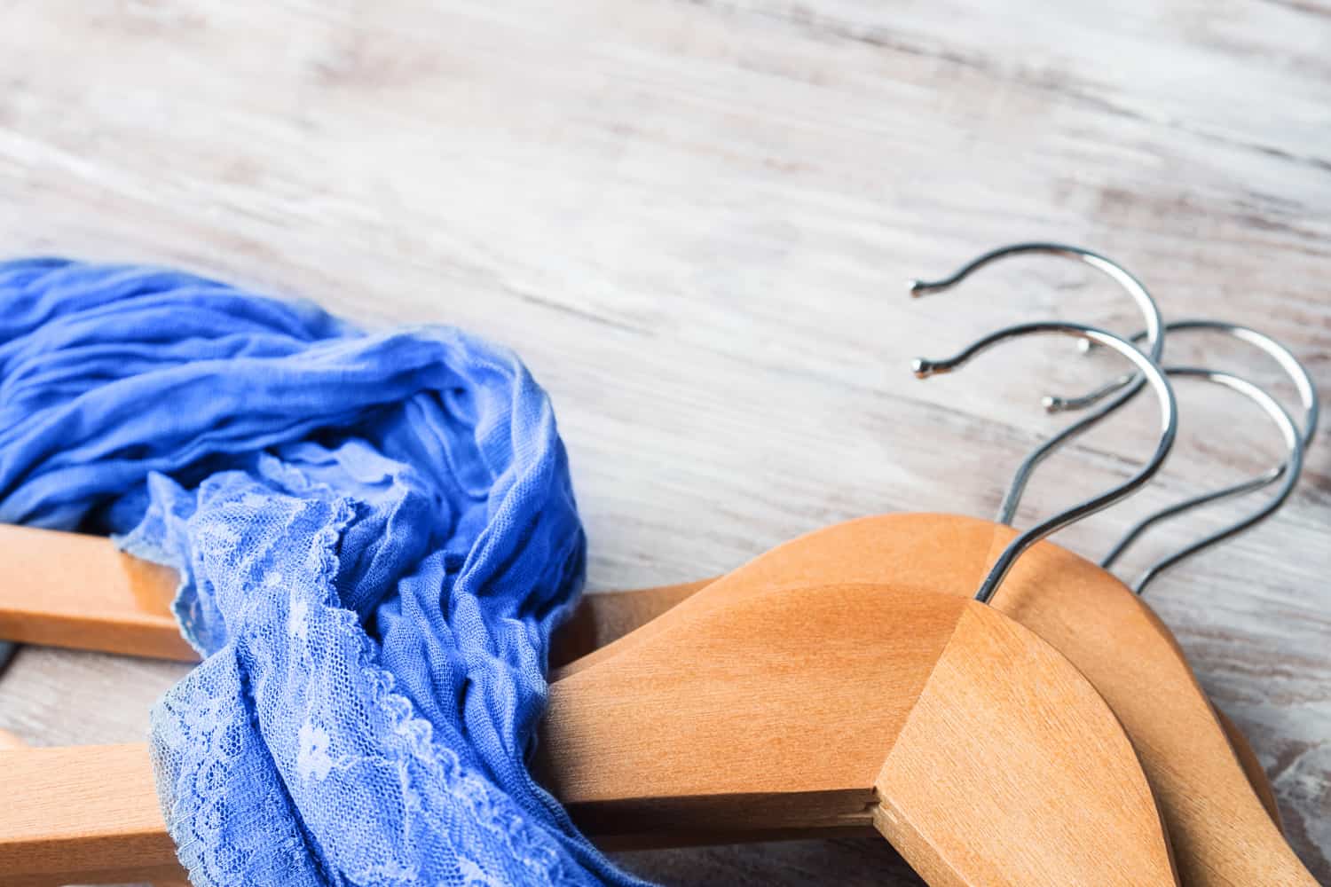 Wooden clothes hangers with classic blue foulard