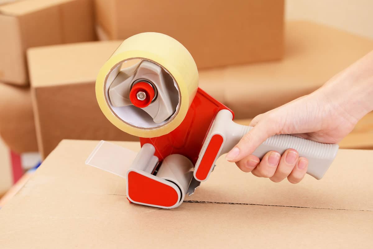 Wrapping a box using a packing tape